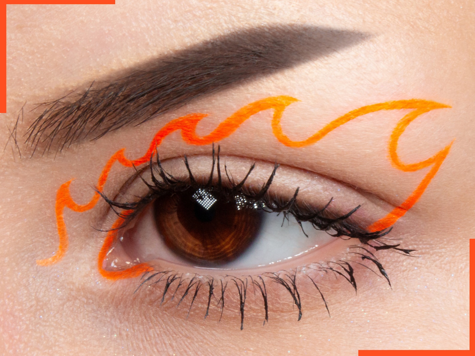 Dare to Be Bold: Empowering Minimalists with an Orange Makeup Look