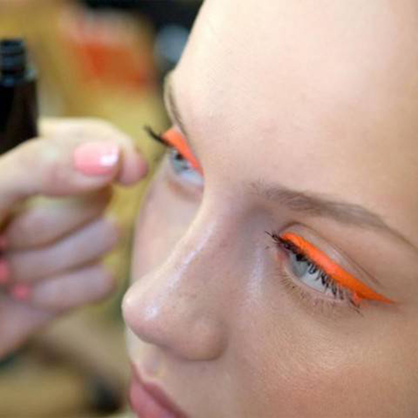 Dare to Be Bold: Empowering Minimalists with an Orange Makeup Look